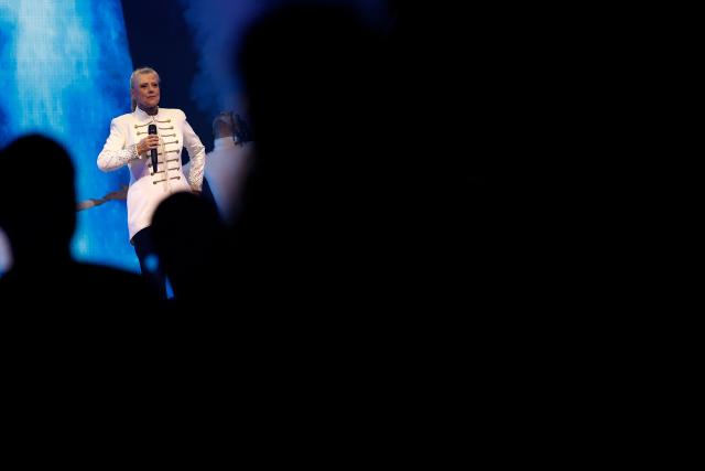 Former French TV host and singer Frederique Hoschede, also known as Dorothee, performs on stage at the Palais des Congres concert hall in Paris on April 4, 2026. (Photo by Kenzo TRIBOUILLARD / AFP)