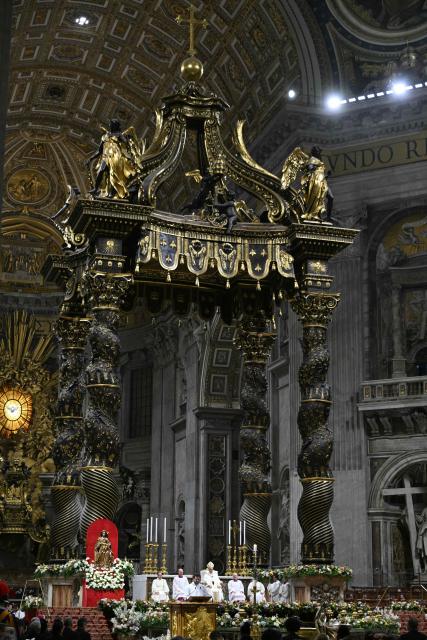 Pope Leo XIV presides over the Easter vigil as part of the Holy Week celebrations, at St Peter's basilica in the Vatican on April 4, 2026. (Photo by Andreas SOLARO / AFP)