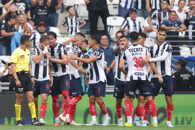 Monterrey's Montenegrin forward #20 Uros Djurdevic (3rd-L) celebrates with teammates after scoring his team's first goal during the Liga MX Clausura football match between Monterrey and San Luis at BBVA stadium in Guadalupe, Nuevo Leon state, Mexico, on April 4, 2026. (Photo by Julio Cesar AGUILAR / AFP)