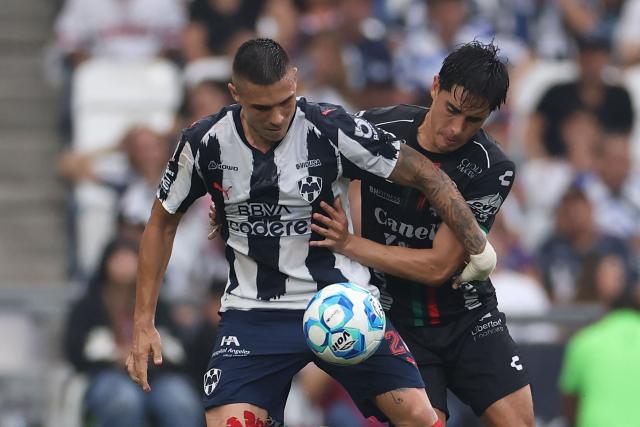 Monterrey's Montenegrin forward #20 Uros Djurdevic (L) and San Luis' defender #02 Roman Torres (R) fight for the ball during the Liga MX Clausura football match between Monterrey and San Luis at BBVA stadium in Guadalupe, Nuevo Leon state, Mexico, on April 4, 2026. (Photo by Julio Cesar AGUILAR / AFP)