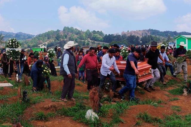 Relatives and friends carry the coffin of Royer Perez Jimenez, a 19-year-old Mexican migrant who was found dead in a US detention center, during his funeral in the Tzotzil indigenous community of San Juan Chamula, Chiapas state, Mexico on April 4, 2026. Royer Perez Jimenez was found dead in a Florida detention center operated by US Immigration and Customs Enforcement (ICE) on March 16, 2026. ICE and the Mexican government gave the presumed cause of death as suicide. (Photo by Luis AGUILAR / AFP)