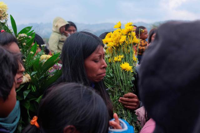 A woman cries during the funeral of Royer Perez Jimenez, a 19-year-old Mexican migrant who was found dead in a US detention center, in the Tzotzil indigenous community of San Juan Chamula, Chiapas state, Mexico on April 4, 2026. Royer Perez Jimenez was found dead in a Florida detention center operated by US Immigration and Customs Enforcement (ICE) on March 16, 2026. ICE and the Mexican government gave the presumed cause of death as suicide. (Photo by Luis AGUILAR / AFP)