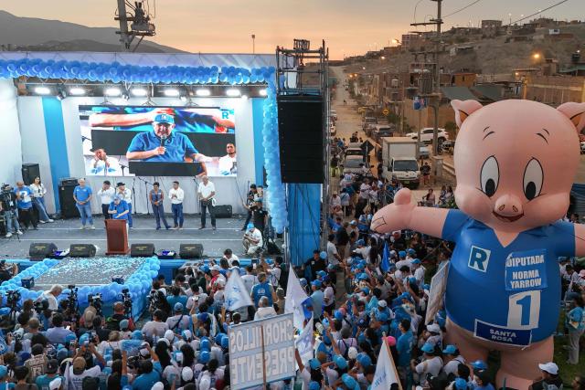 This aerial view shows Peru's presidential candidate Rafael Lopez Aliaga for the Renovacion Popular party speaking during a campaign rally in Lima on April 4, 2026. Peru will hold presidential elections on April 12. (Photo by Connie FRANCE / AFP)