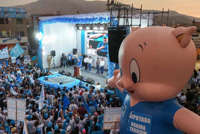 This aerial view shows Peru's presidential candidate Rafael Lopez Aliaga for the Renovacion Popular party speaking during a campaign rally in Lima on April 4, 2026. Peru will hold presidential elections on April 12. (Photo by Connie FRANCE / AFP)