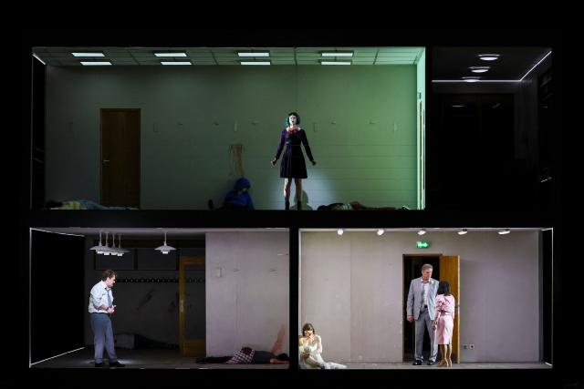 Finnish soprano Vilma Jää (top) performs on stage during a rehearsal of "Innocence", the final opera by the late Finnish composer Kaija Saariaho, at the Metropolitan Opera in New York on April 1, 2026. School shootings are a tragically common occurrence in the United States, but rarely do they grace the stage of one of the world's premier opera houses. But on Monday, Kaija Saariaho's "Innocence" -- which explores how a devastating attack at an international school in Finland reverberates through the lives of its survivors -- will debut at the Metropolitan Opera in New York. (Photo by ANGELA WEISS / AFP)