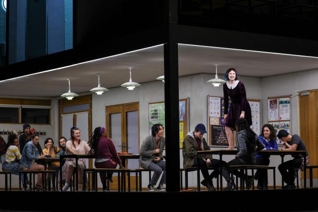 Finnish soprano Vilma Jää (R) performs on stage during a rehearsal of "Innocence", the final opera by the late Finnish composer Kaija Saariaho, at the Metropolitan Opera in New York on April 1, 2026. School shootings are a tragically common occurrence in the United States, but rarely do they grace the stage of one of the world's premier opera houses. But on Monday, Kaija Saariaho's "Innocence" -- which explores how a devastating attack at an international school in Finland reverberates through the lives of its survivors -- will debut at the Metropolitan Opera in New York. (Photo by ANGELA WEISS / AFP)