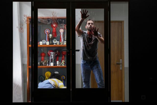 A singer performs on stage during a rehearsal of "Innocence", the final opera by the late Finnish composer Kaija Saariaho, at the Metropolitan Opera in New York on April 1, 2026. School shootings are a tragically common occurrence in the United States, but rarely do they grace the stage of one of the world's premier opera houses. But on Monday, Kaija Saariaho's "Innocence" -- which explores how a devastating attack at an international school in Finland reverberates through the lives of its survivors -- will debut at the Metropolitan Opera in New York. (Photo by ANGELA WEISS / AFP)
