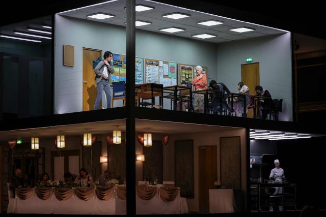 Singers and actors perform on stage during a rehearsal of "Innocence", the final opera by the late Finnish composer Kaija Saariaho, at the Metropolitan Opera in New York on April 1, 2026. School shootings are a tragically common occurrence in the United States, but rarely do they grace the stage of one of the world's premier opera houses. But on Monday, Kaija Saariaho's "Innocence" -- which explores how a devastating attack at an international school in Finland reverberates through the lives of its survivors -- will debut at the Metropolitan Opera in New York. (Photo by ANGELA WEISS / AFP)