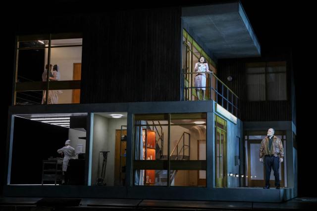 South Korean coloratura soprano Kathleen Kim (2R) and Danish operatic bass Stephen Milling (R) perform on stage during a rehearsal of "Innocence", the final opera by the late Finnish composer Kaija Saariaho, at the Metropolitan Opera in New York on April 1, 2026. School shootings are a tragically common occurrence in the United States, but rarely do they grace the stage of one of the world's premier opera houses. But on Monday, Kaija Saariaho's "Innocence" -- which explores how a devastating attack at an international school in Finland reverberates through the lives of its survivors -- will debut at the Metropolitan Opera in New York. (Photo by ANGELA WEISS / AFP)