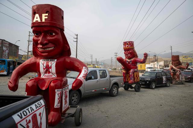 ofFigures depicting erotic huacos from the Moche culture are pictured on a convoy in support to Peru's presidential candidate Rosario Fernandez for the Un Camino Diferente party in San Juan de Lurigancho district, on the outskirts of Lima, on April 4, 2026. Peru will hold presidential elections on April 12. (Photo by ERNESTO BENAVIDES / AFP)