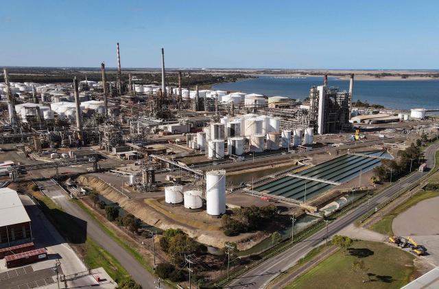 An aerial photo taken on April 4, 2026 shows the Geelong Oil Refinery, one of two oil refineries remaining in Australia. The refinery can process up to 120,000 barrels of oil per day, manufacturing petrol, diesel, LPG, jet fuel and avgas. (Photo by William WEST / AFP)