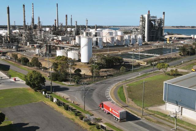 An aerial photo taken on April 4, 2026 shows the Geelong Oil Refinery, one of two oil refineries remaining in Australia. The refinery can process up to 120,000 barrels of oil per day, manufacturing petrol, diesel, LPG, jet fuel and avgas. (Photo by William WEST / AFP)