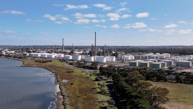 An aerial photo taken on April 4, 2026 shows the Geelong Oil Refinery, one of two oil refineries remaining in Australia. The refinery can process up to 120,000 barrels of oil per day, manufacturing petrol, diesel, LPG, jet fuel and avgas. (Photo by William WEST / AFP)