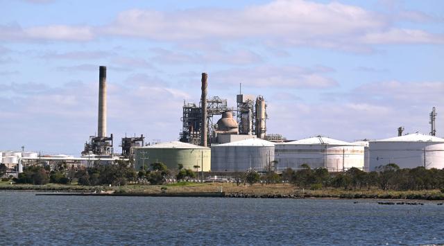 A photo taken on April 4, 2026 shows the Geelong Oil Refinery, one of two oil refineries remaining in Australia. The refinery can process up to 120,000 barrels of oil per day, manufacturing petrol, diesel, LPG, jet fuel and avgas. (Photo by William WEST / AFP)