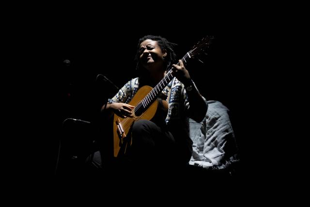 Brazilian guitarist Gabriele Leite performs on stage during the Queremos music festival at the Carlos Gomes theatre in Rio de Janeiro, Brazil on April 4, 2026. (Photo by Pablo PORCIUNCULA / AFP)