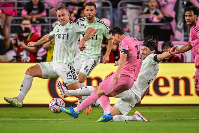 Inter Miami's Argentine forward #10 Lionel Messi shoots as he's defended by Austin's Ukranian defender #05 Oleksandr Svatok and Austin's Spanish midfielder #06 Ilie Sanchez during a Major League Soccer (MLS) regular season football match between Inter Miami CF and Austin FC at the newly inaugurated NU Stadium in Miami, Florida, on April 4, 2026. (Photo by Giorgio VIERA / AFP)