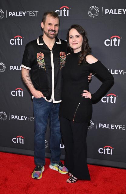 US screenwriters Gordon Smith (L) and Jenn Carroll attend the PaleyFest LA 2026 big screen presentation of Apple TV's "Pluribus: Season One Finale" at the Dolby Theatre in Hollywood, California, on April 4, 2026. (Photo by LISA O'CONNOR / AFP)