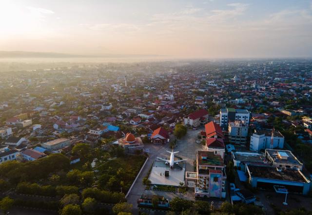 This aerial picture shows a general view with a Boeing 737 mock-up installed at a Hajj pilgrimage centre in Banda Aceh on April 5, 2026. (Photo by CHAIDEER MAHYUDDIN / AFP)