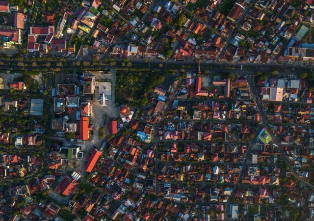 This aerial picture shows a general view with a Boeing 737 mock-up (C-L) installed at a Hajj pilgrimage centre in Banda Aceh on April 5, 2026. (Photo by CHAIDEER MAHYUDDIN / AFP)