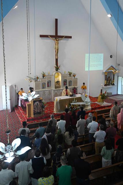 Christians attend Easter Sunday mass at the Fatima Church in Islamabad on April 5, 2026. (Photo by Aamir QURESHI / AFP)