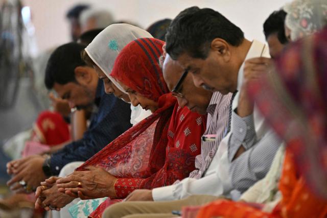 Christians attend Easter Sunday mass at the Central Brooks Memorial Church in Karachi on April 5, 2026. (Photo by Asif HASSAN / AFP)