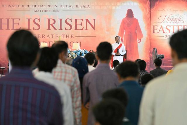 Christians attend Easter Sunday mass at the Central Brooks Memorial Church in Karachi on April 5, 2026. (Photo by Asif HASSAN / AFP)