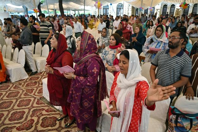 Christians attend Easter Sunday mass at the Central Brooks Memorial Church in Karachi on April 5, 2026. (Photo by Asif HASSAN / AFP)