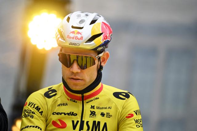 Belgian Wout van Aert of Team Visma-Lease a Bike waits before the start of the men's race of the 'Ronde van Vlaanderen/ Tour des Flandres/ Tour of Flanders' UCI WorldTour one day cycling race, 278 km from Antwerp to Oudenaarde, on April 5, 2026. (Photo by ELIAS ROM / Belga / AFP) / Belgium OUT