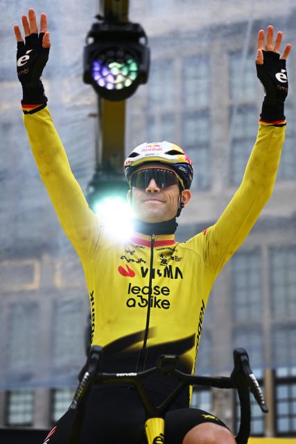 Belgian Wout van Aert of Team Visma-Lease a Bike waits before the start of the men's race of the 'Ronde van Vlaanderen/ Tour des Flandres/ Tour of Flanders' UCI WorldTour one day cycling race, 278 km from Antwerp to Oudenaarde, on April 5, 2026. (Photo by ELIAS ROM / Belga / AFP) / Belgium OUT