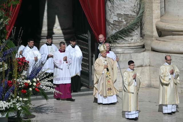 Pope Leo XIV presides over the Easter Mass as part of the Holy Week celebrations, at St Peter's square in the Vatican on April 5, 2026. (Photo by Andreas SOLARO / AFP)