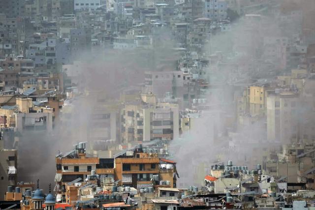 Smoke rises from the site of an Israeli airstrike that targeted an area in Beirut's southern suburbs, on April 5, 2026. The Israeli military said on April 5 that it had begun striking Hezbollah targets in the Lebanese capital Beirut. (Photo by ibrahim AMRO / AFP) / 