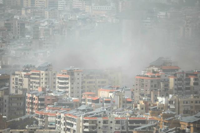 Smoke rises from the site of an Israeli airstrike that targeted an area in Beirut's southern suburbs, during haze on April 5, 2026. Israel struck a building in south Beirut on April 5 after issuing an evacuation warning, Lebanese state media reported, as the Israeli military said it was hitting Hezbollah targets. (Photo by ibrahim AMRO / AFP) / 