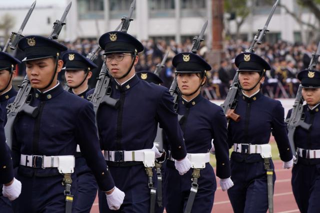 EDITORS NOTE: Graphic content / National Defense Academy students participate in a review parade as part of the National Defense Academy Entrance Ceremony in Yokosuka, Kanagawa Prefecture on April 5, 2026. (Photo by Kazuhiro NOGI / AFP)