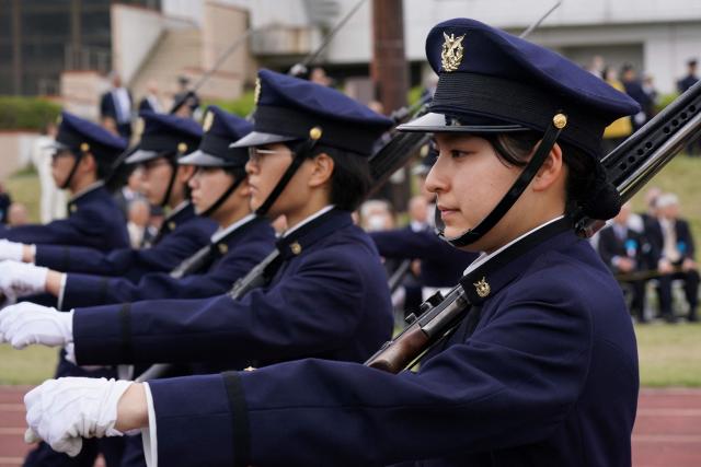 EDITORS NOTE: Graphic content / National Defense Academy students participate in a review parade as part of the National Defense Academy Entrance Ceremony in Yokosuka, Kanagawa Prefecture on April 5, 2026. (Photo by Kazuhiro NOGI / AFP)