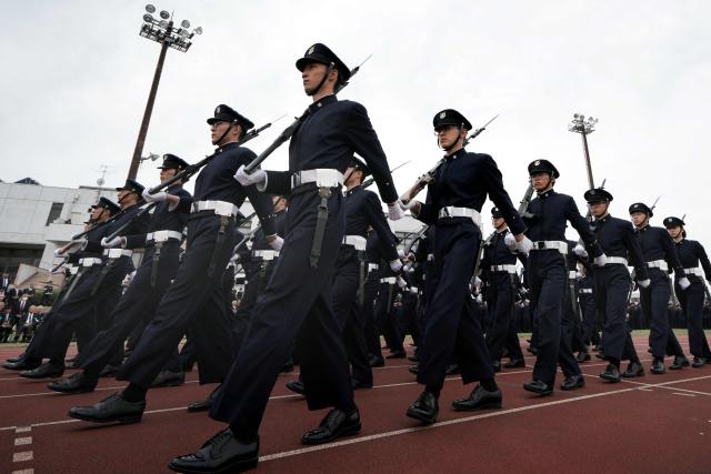 EDITORS NOTE: Graphic content / National Defense Academy students participate in a review parade as part of the National Defense Academy Entrance Ceremony in Yokosuka, Kanagawa Prefecture on April 5, 2026. (Photo by Kazuhiro NOGI / AFP)