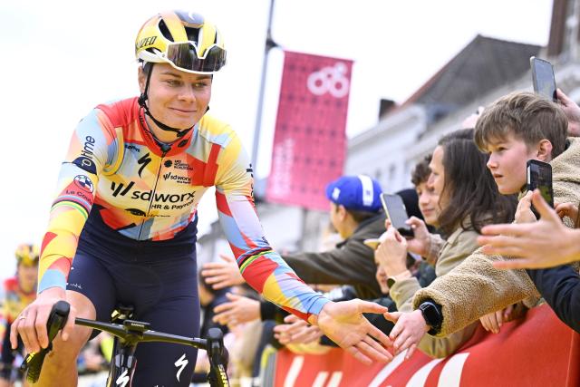 Belgian rider Lotte Kopecky of SD Worx-Protime arrives to take the start of the women's race of the 'Ronde van Vlaanderen/ Tour des Flandres/ Tour of Flanders' UCI WorldTour one day cycling race, 164,1 km with start and finish in Oudenaarde, on April 5, 2026. (Photo by JASPER JACOBS / Belga / AFP) / Belgium OUT