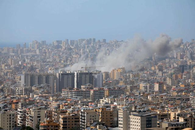 Smoke rises from the site of an Israeli strike in Beirut's southern suburbs, on April 5, 2026. An Israeli strike hit south Beirut on April 5, Lebanese state media reported, with a medical source telling AFP it made impact about 100 metres away from a public hospital. The strike hit Beirut's Jnah neighbourhood near Rafik Hariri University Hospital, the largest public medical facility in the country. (Photo by ibrahim AMRO / AFP) / 