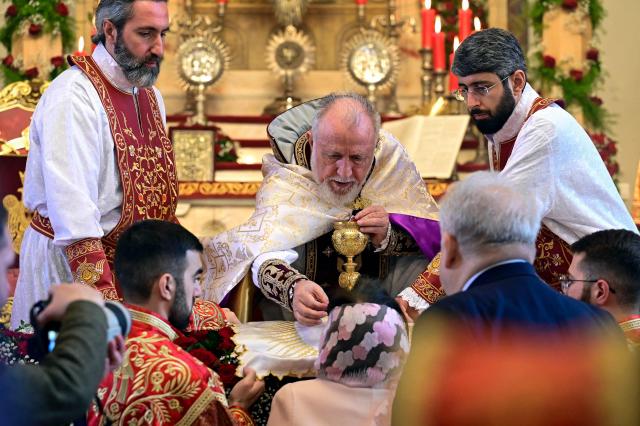 Supreme Patriarch and head of the Catholicos of All Armenians Garegin II (Karekin II) leads the Easter service at the Church of Holy Etchmiadzin, in Echmiadzin on April 5, 2026. (Photo by KAREN MINASYAN / AFP)
