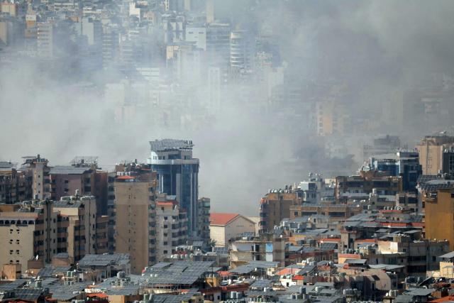 Smoke rises from the site of an Israeli strike in Beirut's southern suburbs, on April 5, 2026. An Israeli strike hit south Beirut on April 5, Lebanese state media reported, with a medical source telling AFP it made impact about 100 metres away from a public hospital. The strike hit Beirut's Jnah neighbourhood near Rafik Hariri University Hospital, the largest public medical facility in the country. (Photo by ibrahim AMRO / AFP) / 