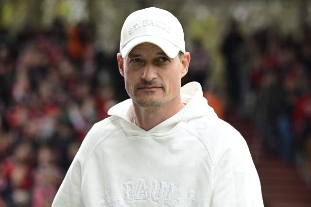 St Pauli's German head coach Alexander Blessin looks on ahead the German first division Bundesliga football match between Union Berlin and St Pauli in Berlin on April 5, 2026. (Photo by John MACDOUGALL / AFP) / DFL REGULATIONS PROHIBIT ANY USE OF PHOTOGRAPHS AS IMAGE SEQUENCES AND/OR QUASI-VIDEO
