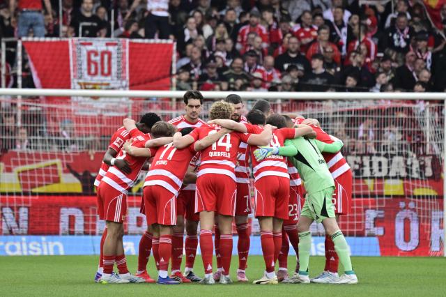 Union Berlin's players gather ahead the German first division Bundesliga football match between Union Berlin and St Pauli in Berlin on April 5, 2026. (Photo by John MACDOUGALL / AFP) / DFL REGULATIONS PROHIBIT ANY USE OF PHOTOGRAPHS AS IMAGE SEQUENCES AND/OR QUASI-VIDEO
