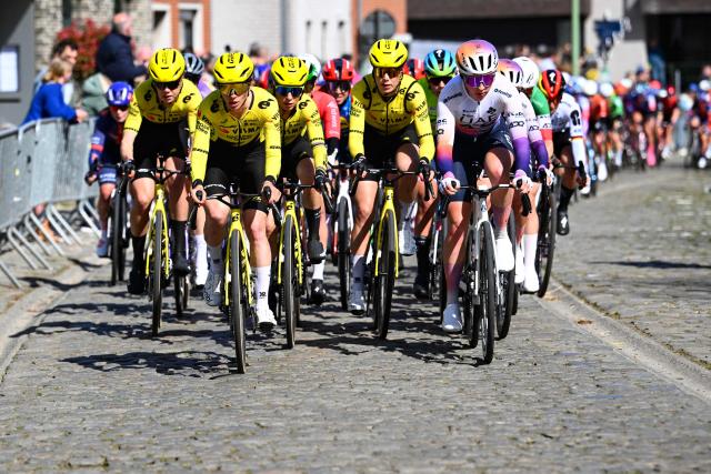The pack of riders (peloton) cycles on a cobblestone sector during the women's race of the 'Ronde van Vlaanderen/ Tour des Flandres/ Tour of Flanders' UCI WorldTour one day cycling race, 164,1 km with start and finish in Oudenaarde, on April 5, 2026. (Photo by Tomas SISK / Belga / AFP) / Belgium OUT