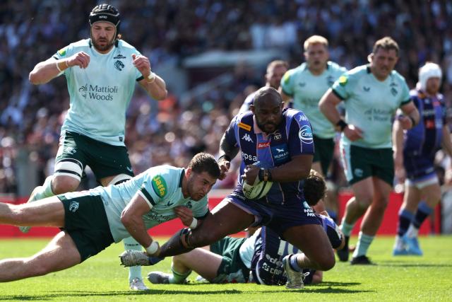 Bordeaux-Begles' French prop Jefferson Poirot is tackled by Leicester's English full back Freddie Steward (L) during the European Rugby Champions Cup round of 16 rugby union match, between the Union Bordeaux Bègles (UBB) and the Leicester Tigers at the Stade Chaban-Delmas in Bordeaux on April 5, 2026. (Photo by ROMAIN PERROCHEAU / AFP)