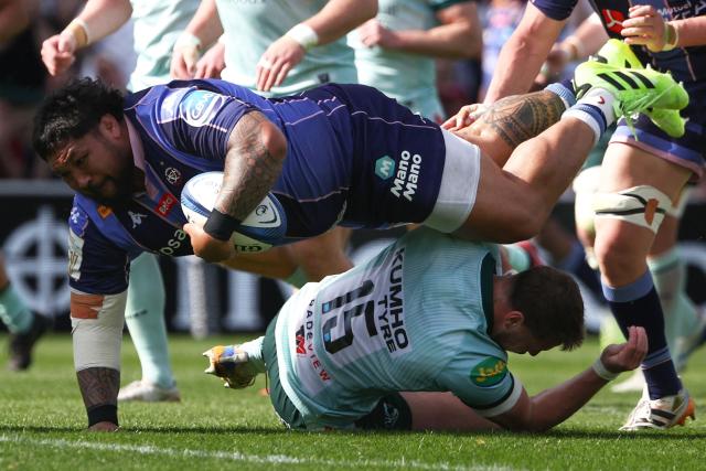 TOPSHOT - Bordeaux-Begles' New Zealand prop Ben Tameifuna dives across the line to score a try during the European Rugby Champions Cup round of 16 rugby union match, between the Union Bordeaux Bègles (UBB) and the Leicester Tigers at the Stade Chaban-Delmas in Bordeaux on April 5, 2026. (Photo by ROMAIN PERROCHEAU / AFP)