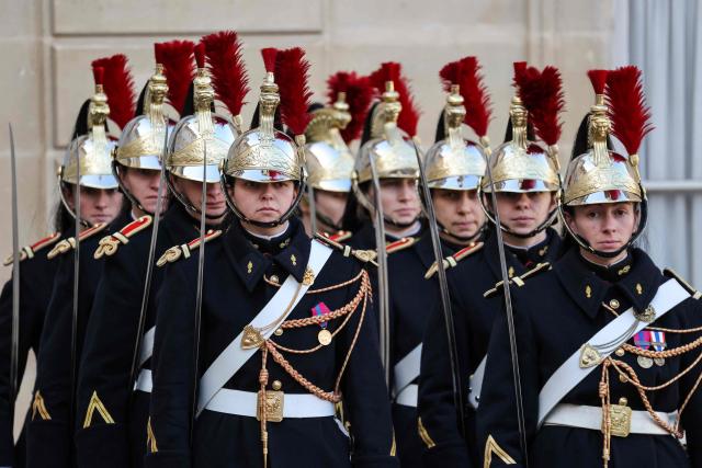 (FILES) French Republican Guards prepare before diplomatic meetings at the Elysee presidential Palace in Paris on January 30, 2026. An investigation is underway in Paris following a complaint filed by a gendarme who denounces ‘racist harassment’ within the prestigious Republican Guard. The 29-year-old serviceman filed his complaint on December 17, 2025, and was then interviewed on January 21, 2026, according to a source close to the case. (Photo by Ludovic MARIN / AFP)