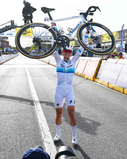 FDJ United-Suez's Dutch rider Demi Vollering celebrates winning the women's race of the 'Ronde van Vlaanderen/ Tour des Flandres/ Tour of Flanders' UCI WorldTour one day cycling race, 164,1 km with start and finish in Oudenaarde, on April 5, 2026. (Photo by ERIC LALMAND / Belga / AFP) / Belgium OUT