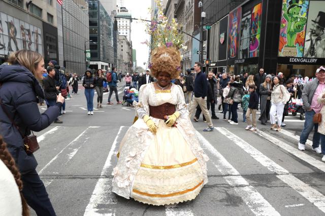 People participate in the annual Easter Parade and Bonnet Festival on Fifth Avenue in New York City on April 5, 2026. (Photo by TIMOTHY A. CLARY / AFP)