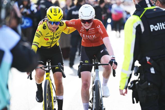 Team Visma-Lease a Bike's French rider Pauline Ferrand Prevot (L) taking second place and Fenix-Premier Tech's Dutch rider Puck Pieterse taking third place cycle past the finish line of the women's race of the 'Ronde van Vlaanderen/ Tour des Flandres/ Tour of Flanders' UCI WorldTour one day cycling race, 164,1 km with start and finish in Oudenaarde, on April 5, 2026. (Photo by DAVID PINTENS / Belga / AFP) / Belgium OUT