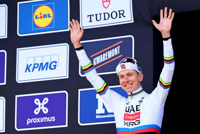 UAE Team Emirates  Slovenian rider Tadej Pogacar celebrates his victory on the podium after the men's race of the 'Ronde van Vlaanderen/ Tour des Flandres/ Tour of Flanders' UCI WorldTour one day cycling race, 278 km from Antwerp to Oudenaarde, in Haaltert on April 5, 2026. (Photo by JASPER JACOBS / Belga / AFP) / Belgium OUT