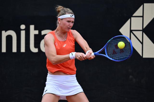 Czech Republic's Marie Bouzkova returns the ball to Hungary's Panna Udvardy during the WTA Bogota women's singles final match at the Country Club in Bogota on April 5, 2026. (Photo by RAUL ARBOLEDA / AFP)